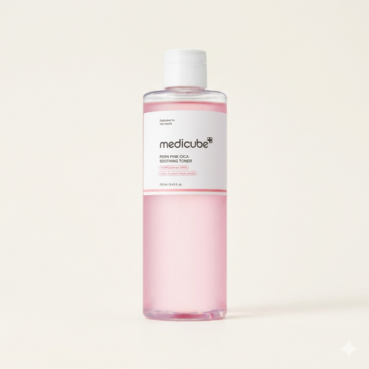 Pink bottle with white label on a light beige background